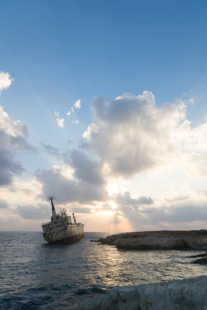 Without exposure compensation (the camera's 'correct' exposure), on this image of shipwreck in Cyprus, the sky looks too light