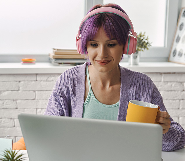 woman learning canva online at laptop warmed up woman learning canva online at laptop warmed up